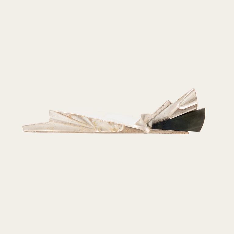 Zoltan Popovits, a "Railo" silver brooch set with spectrolite (variety of labradorite) for Lapponia 1991.