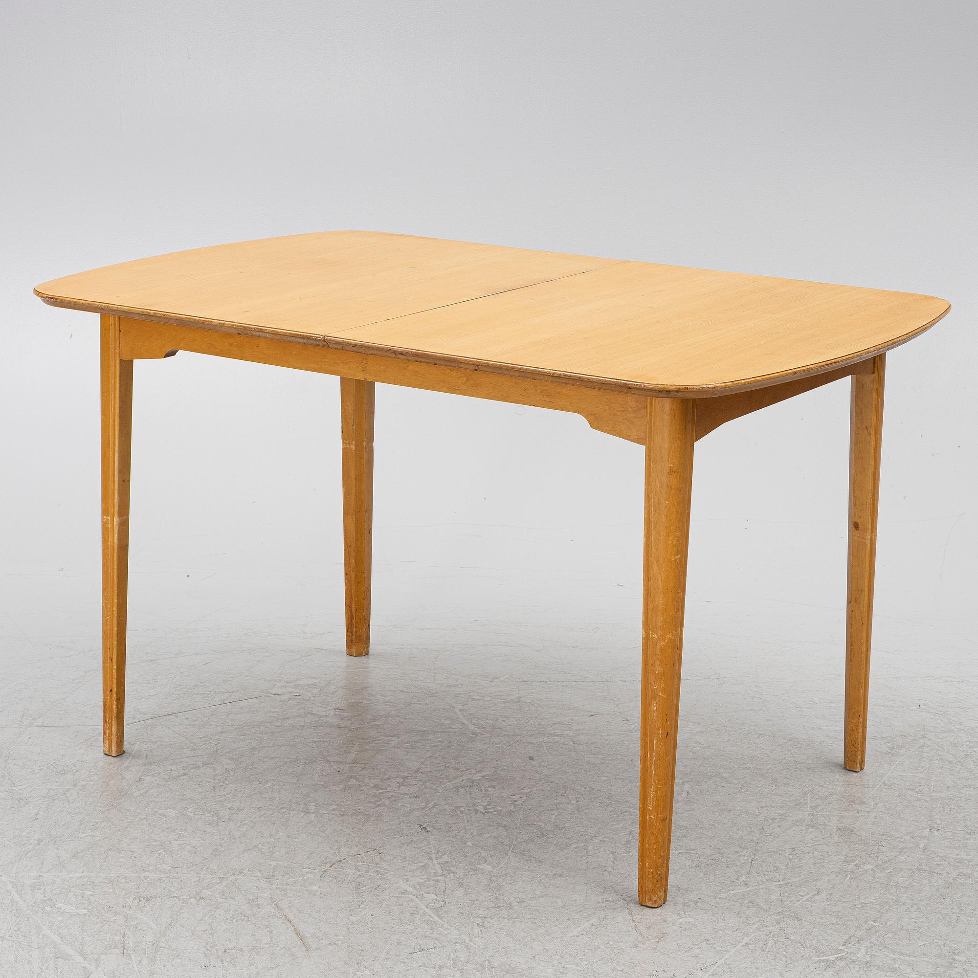 A dining table with six chairs, Sweden, 1940's.