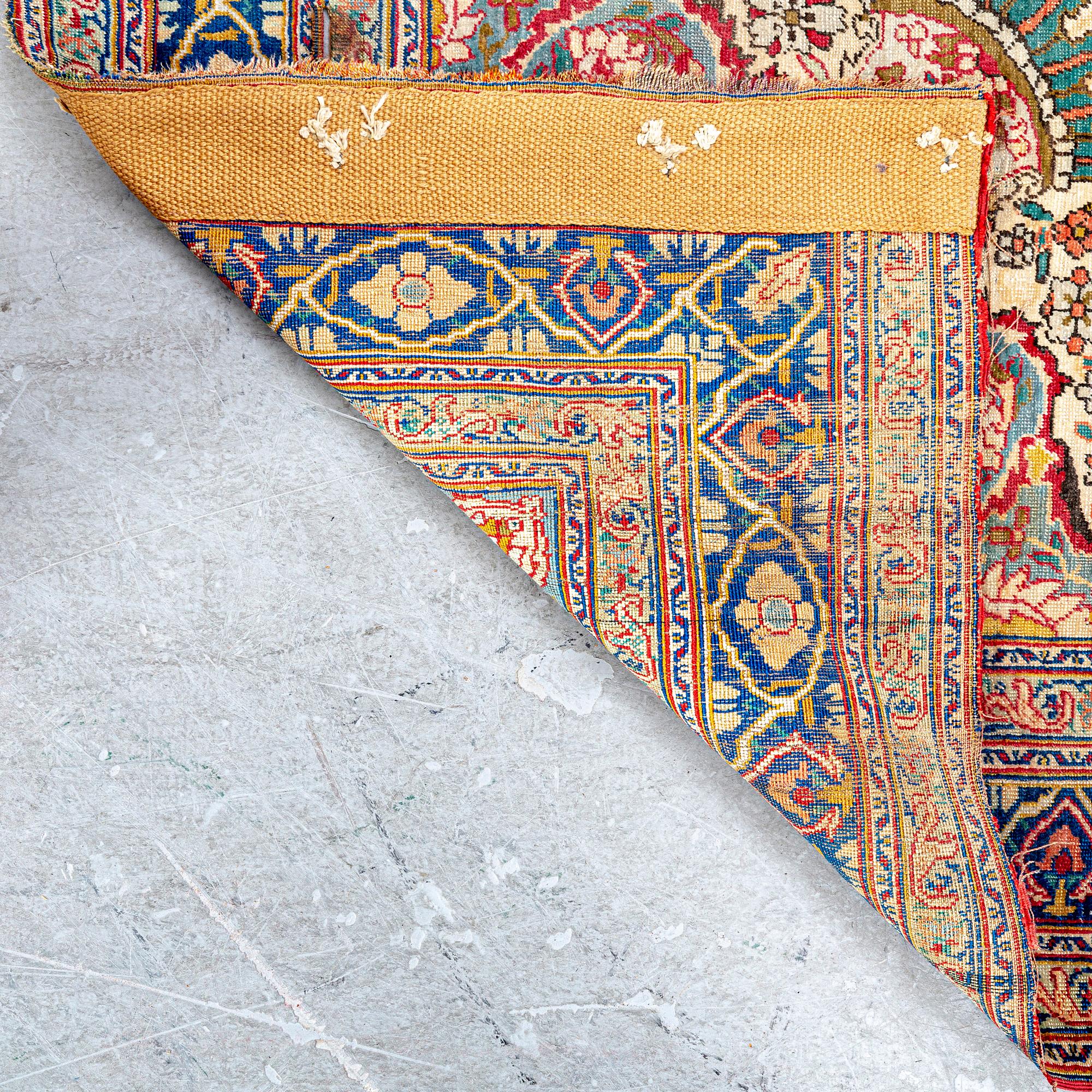 An antique Turkish /Hereke) signed carpet ca 200x121 cm.