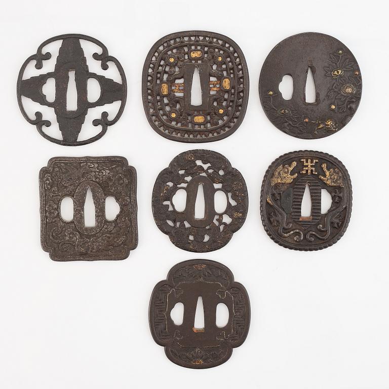 Seven tsuba of different origin, 18th - 20th Century.