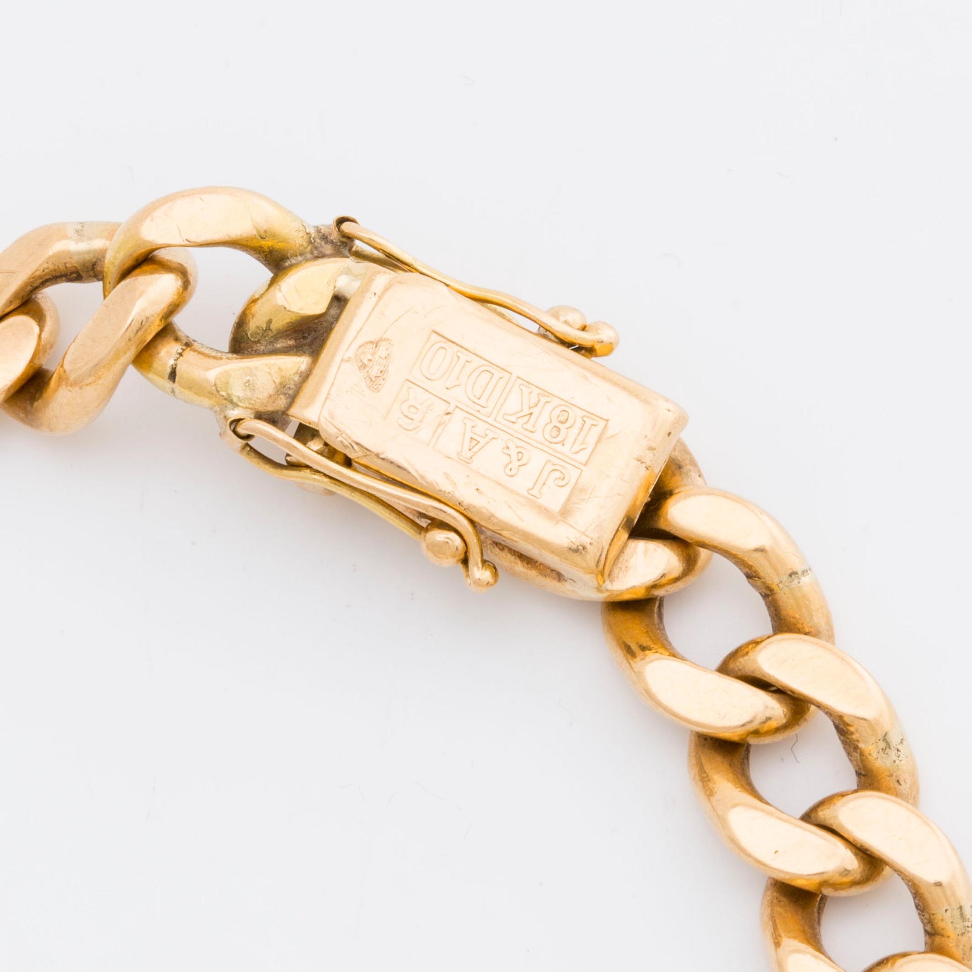ARMBAND 18K guld pansarlänk, 57,0 g,  Jo-Ans Guld Köping 1978.