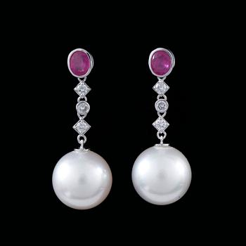 132. A pair of cultured pearl, 13 mm,  diamond and ruby earrings.