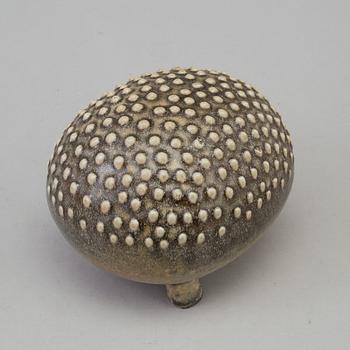 A stoneware figurine by Lisa Larson.