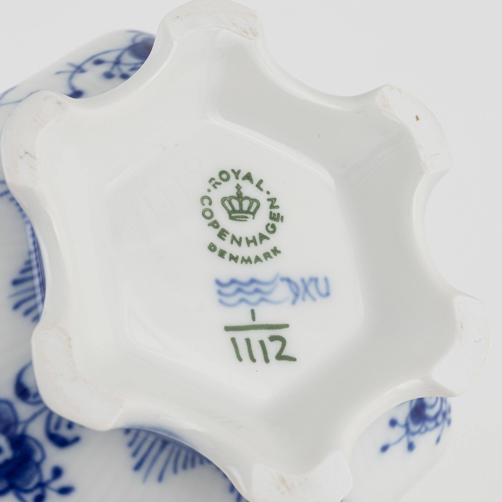 A 'Musselmalet' coffee pot, a sugarbowl and a creamer, Royal Copenhagen, Denmark.