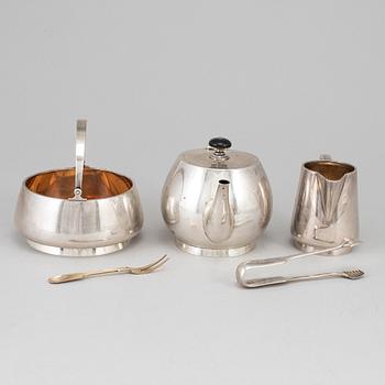 A Russian early 20th century parcel-gilt silver 5 piece tea-set, mark of Grachev, St. Petersburg 1908-1917.