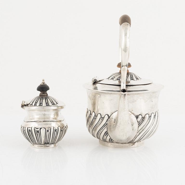 A silver coffee pot and a sugarbowl, including John Aldwinckle & Thomas Slater, London, England, 1844.