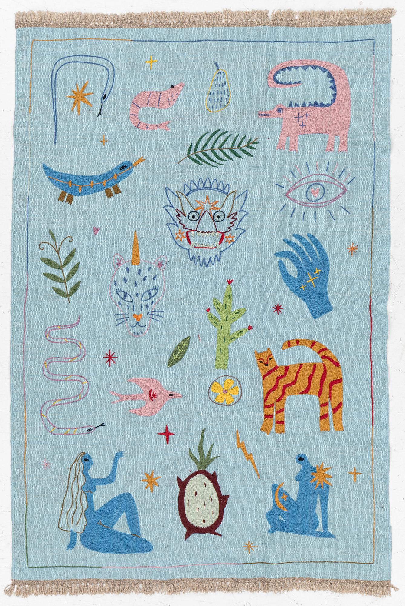 A hand-embroidered kelim rug, c. 189 x 126 cm.