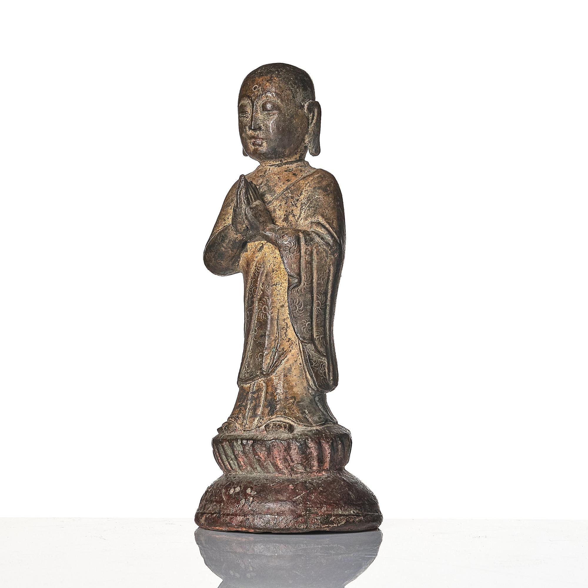 A bronze sculpture of Ananda, Ming dynasty (1368-1644).