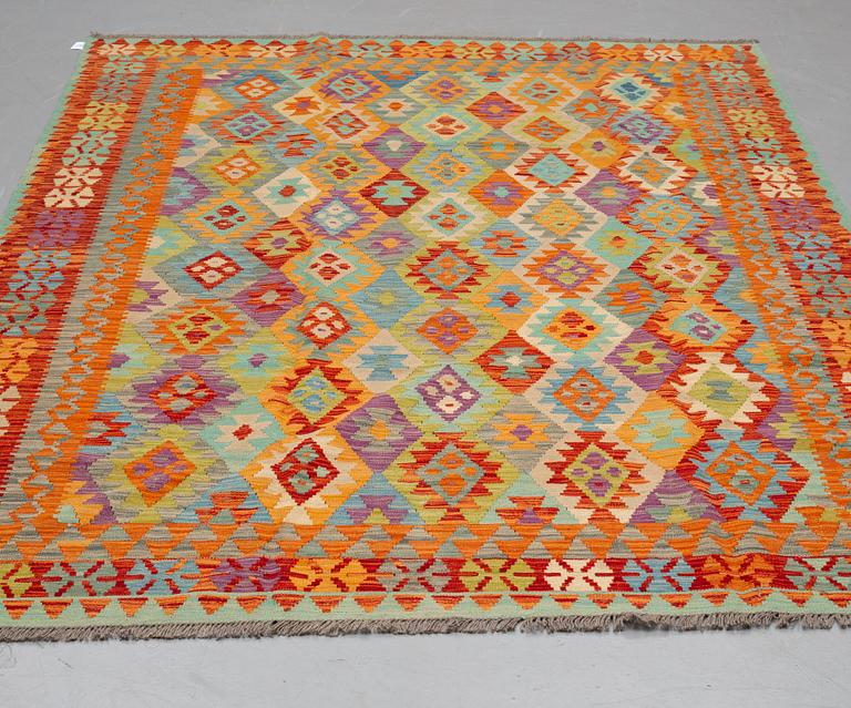 A CARPET, kilim 291 x 202 cm.