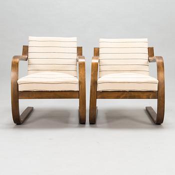 Alvar Aalto, a pair of mid-20th century armchairs '34', Huonekalu- ja Rakennustyötehdas A.B.