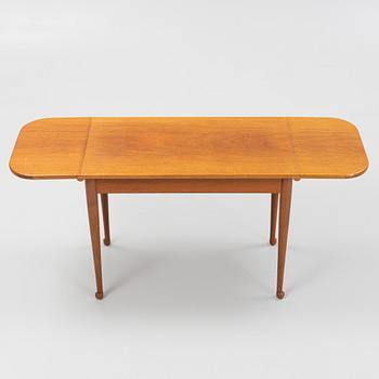 A Josef Frank drop-leaf table, model B 1007, Firma Svenskt Tenn, circa 1940.