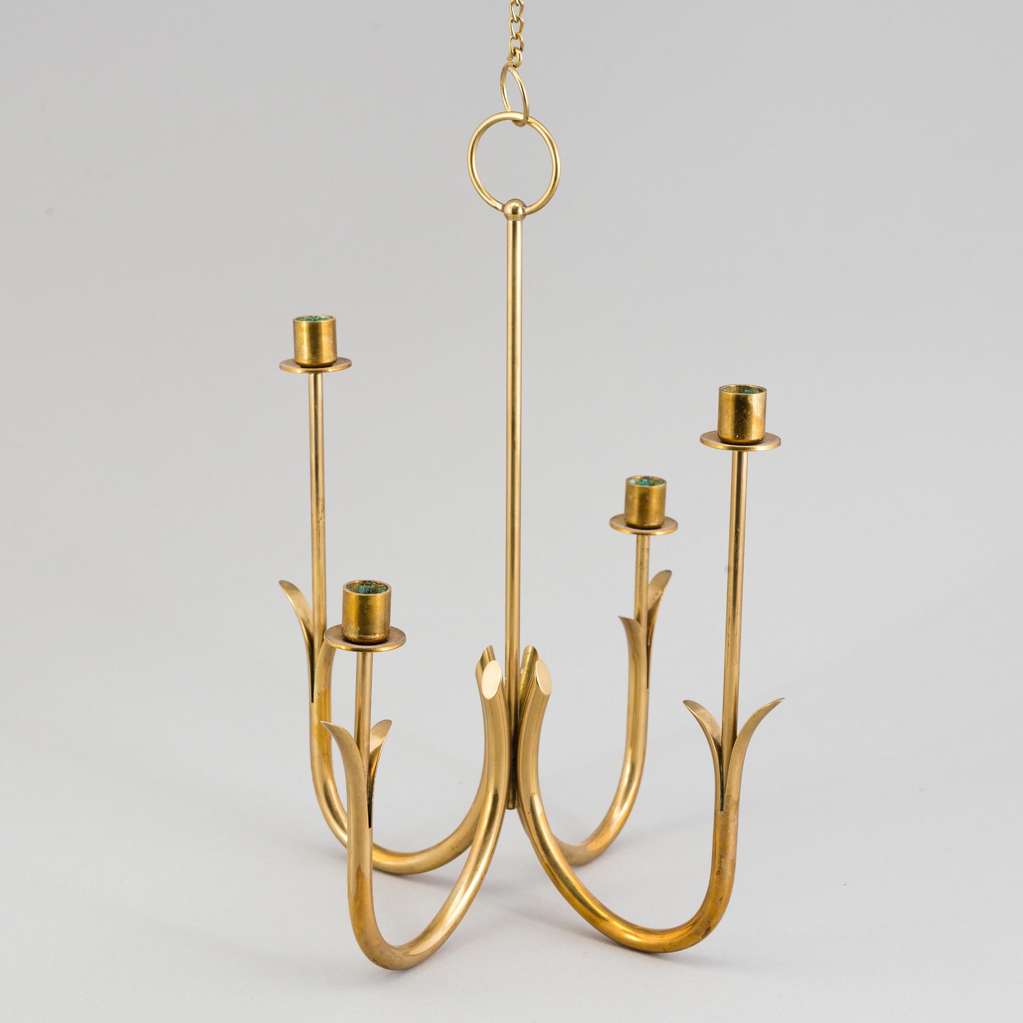 A brass candelabrum by Gunnar Ander for Ystad Metall.