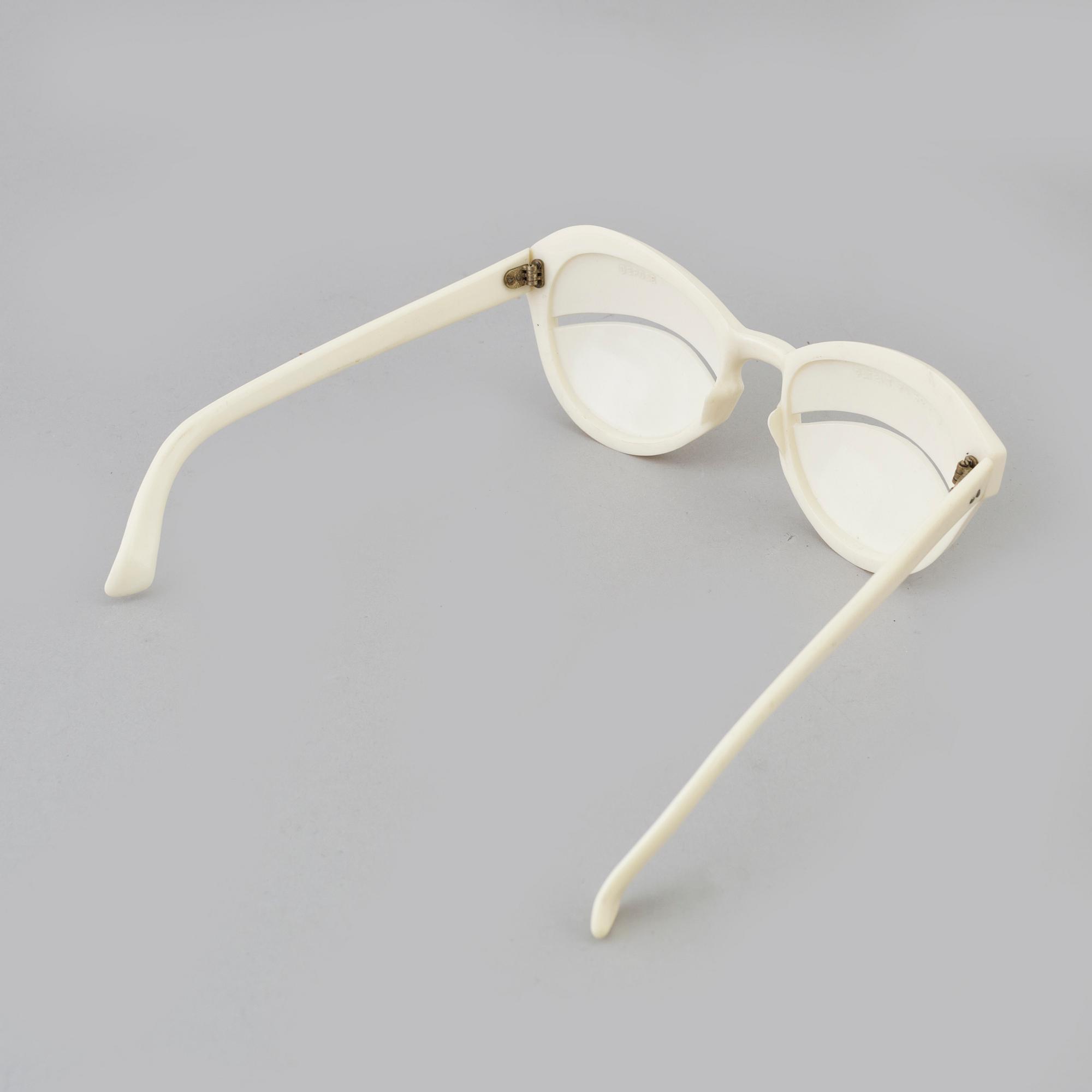 André Courrèges, a pair of 'Eskimo Eclipse' sunglasses, designed in 1965.