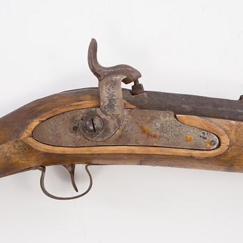 A percussion lock rifle, mid 20th century.