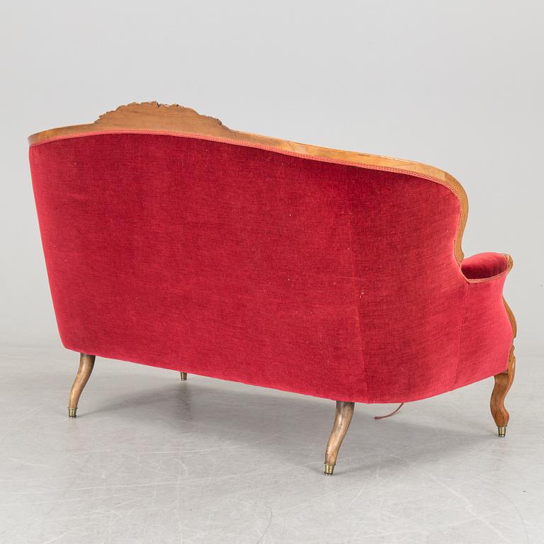 A sofa, circa 1900.