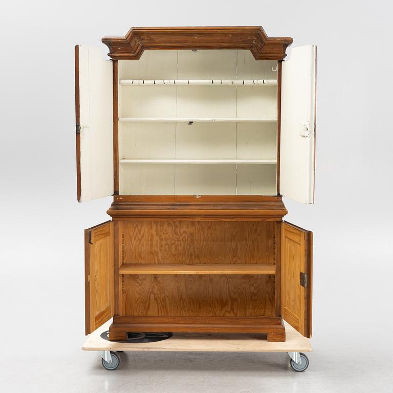 A pine cabinet, 18th Century and first half of the 20th Century.