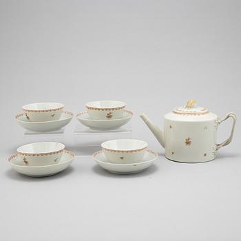 A set of four tea cups and dishes, and one teapot, Qing dynasty, Qianlong, (1736-95).