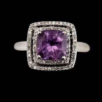 RING, 14K guld, diamanter tot ca 0.25 ct och ametister. Total vikt ca 4,5 g.