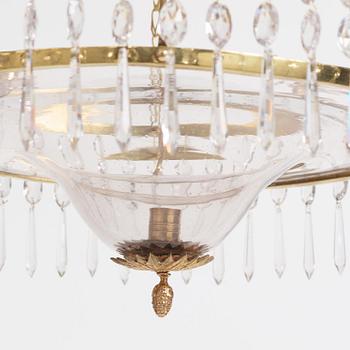 A late Gustavian gilt brass and cut glass seven-light chandelier, late 18th century.