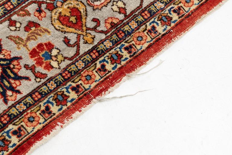 A oriental carpet, ca 320 x 223 cm.
