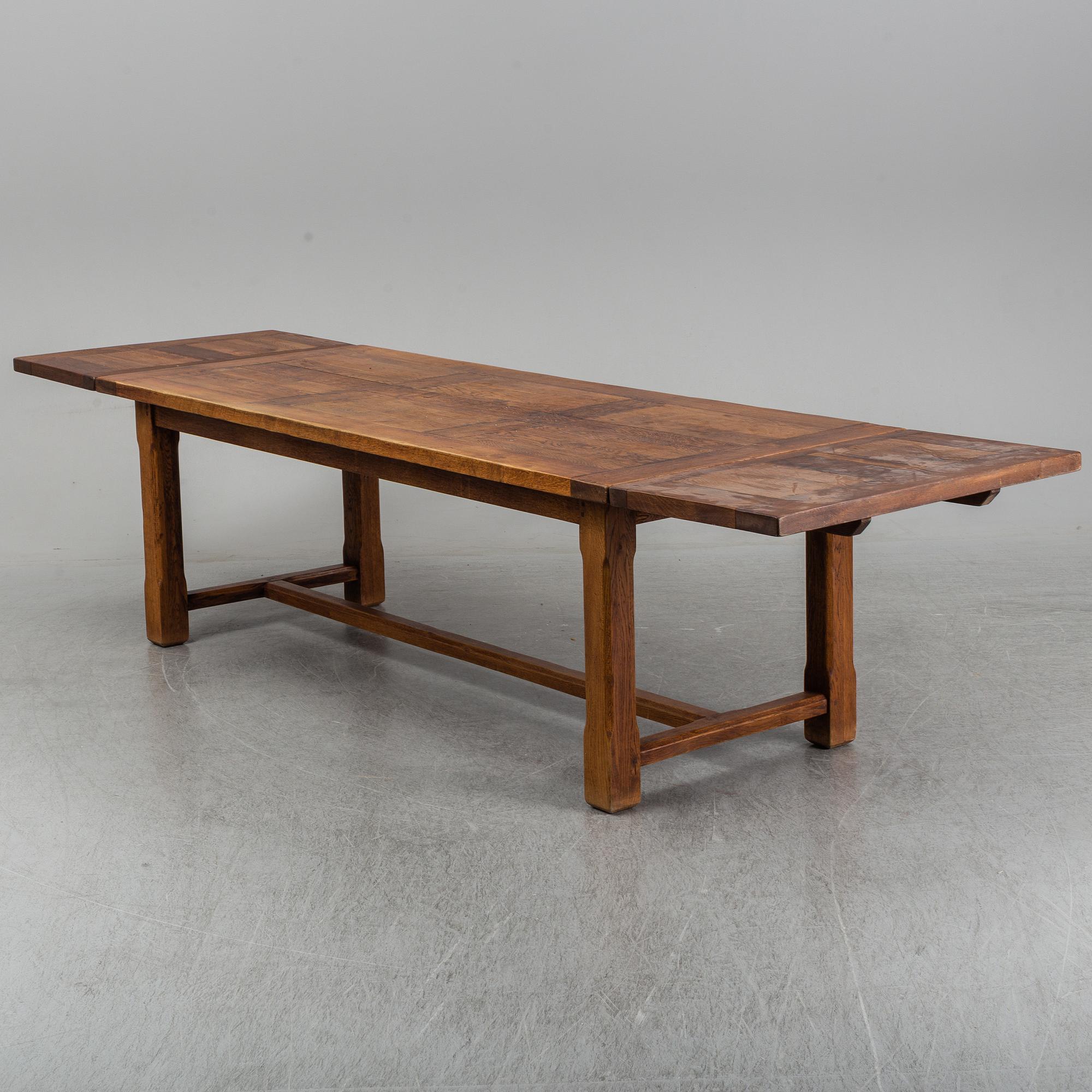 A mid 20th century oak dining table.