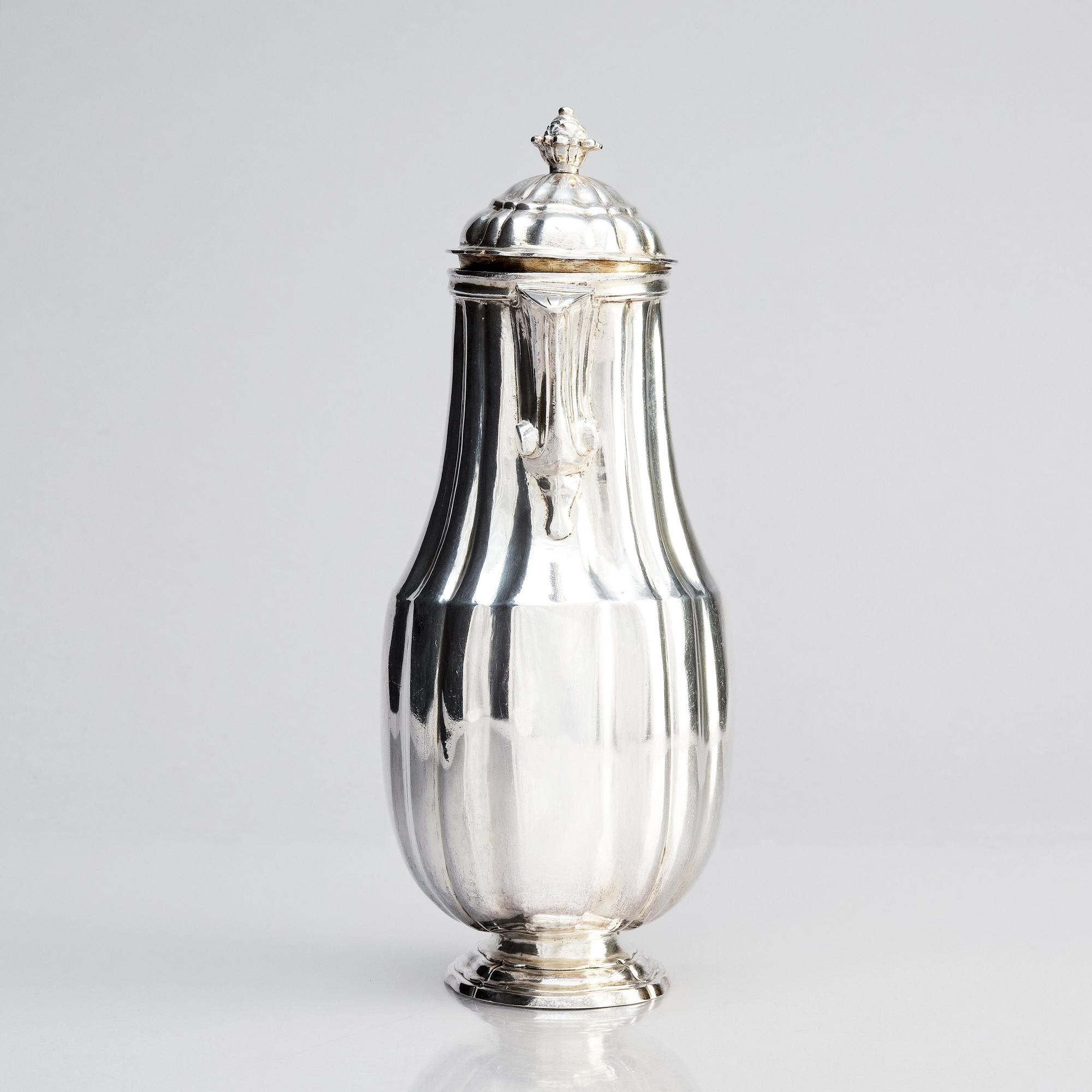 A Spanish 18th century Rococo silver coffee-pot, city mark of Barcelona. Unclear makers mark.