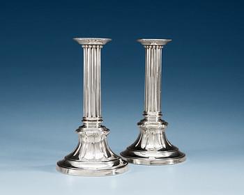 830. A PAIR OF SWEDISH SILVER CANDLESTICKS, Makers mark of Peter Ohlijn, Karlskrona 1785.