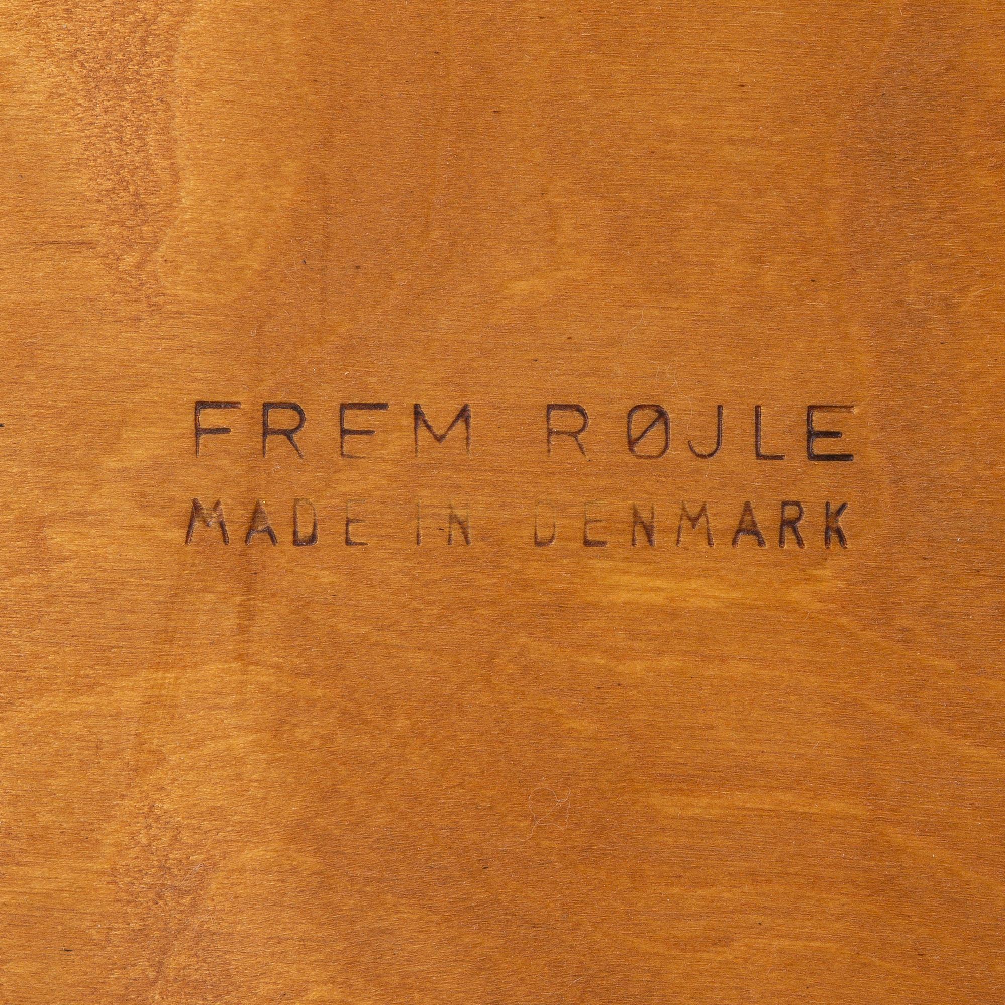 Hans Olsen, a dining table and four chairs, Frem Røjle, Denmark, 1950's.