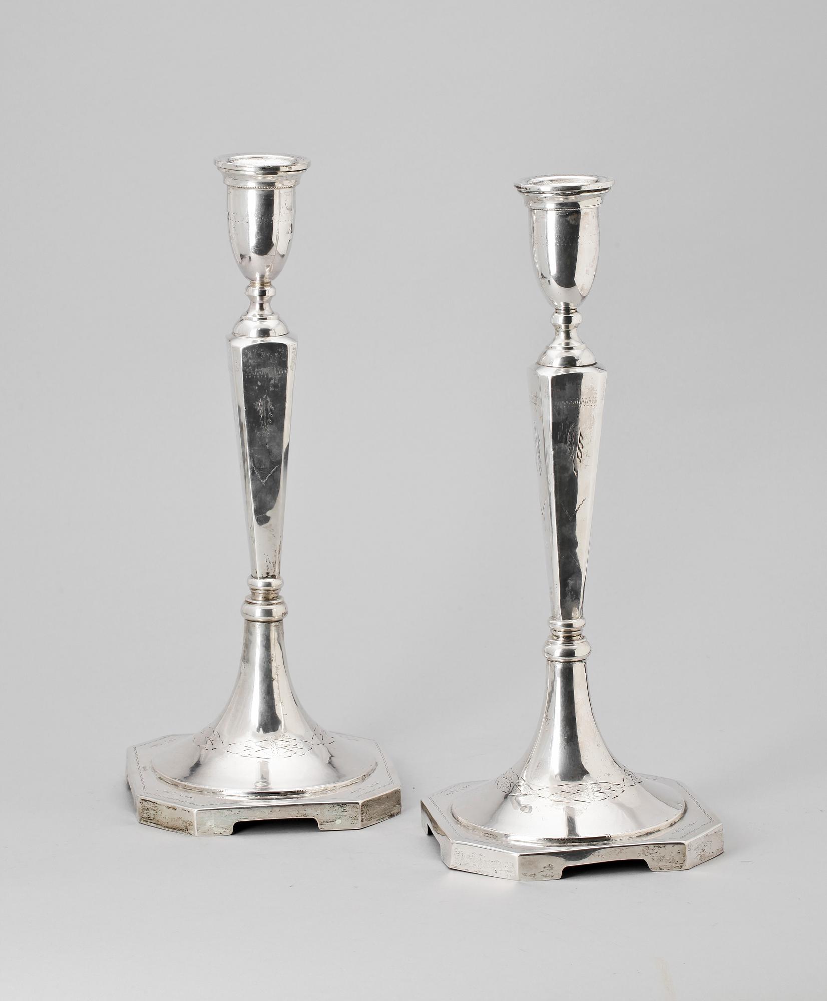 LJUSSTAKAR ett par, silver, trol Polen, 1900-talets början. Vikt ca 880 g.