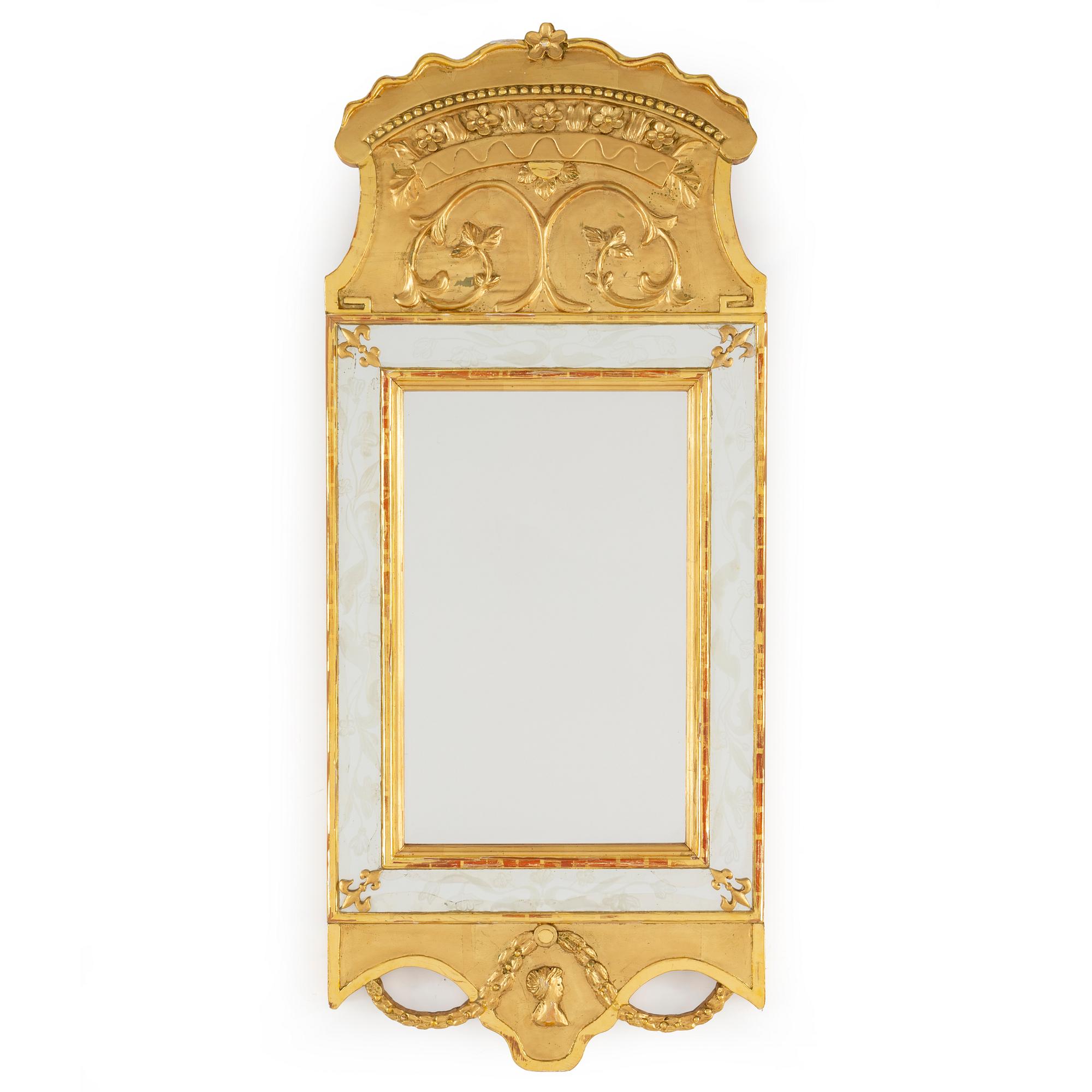 An empire style mirror, 20th century.