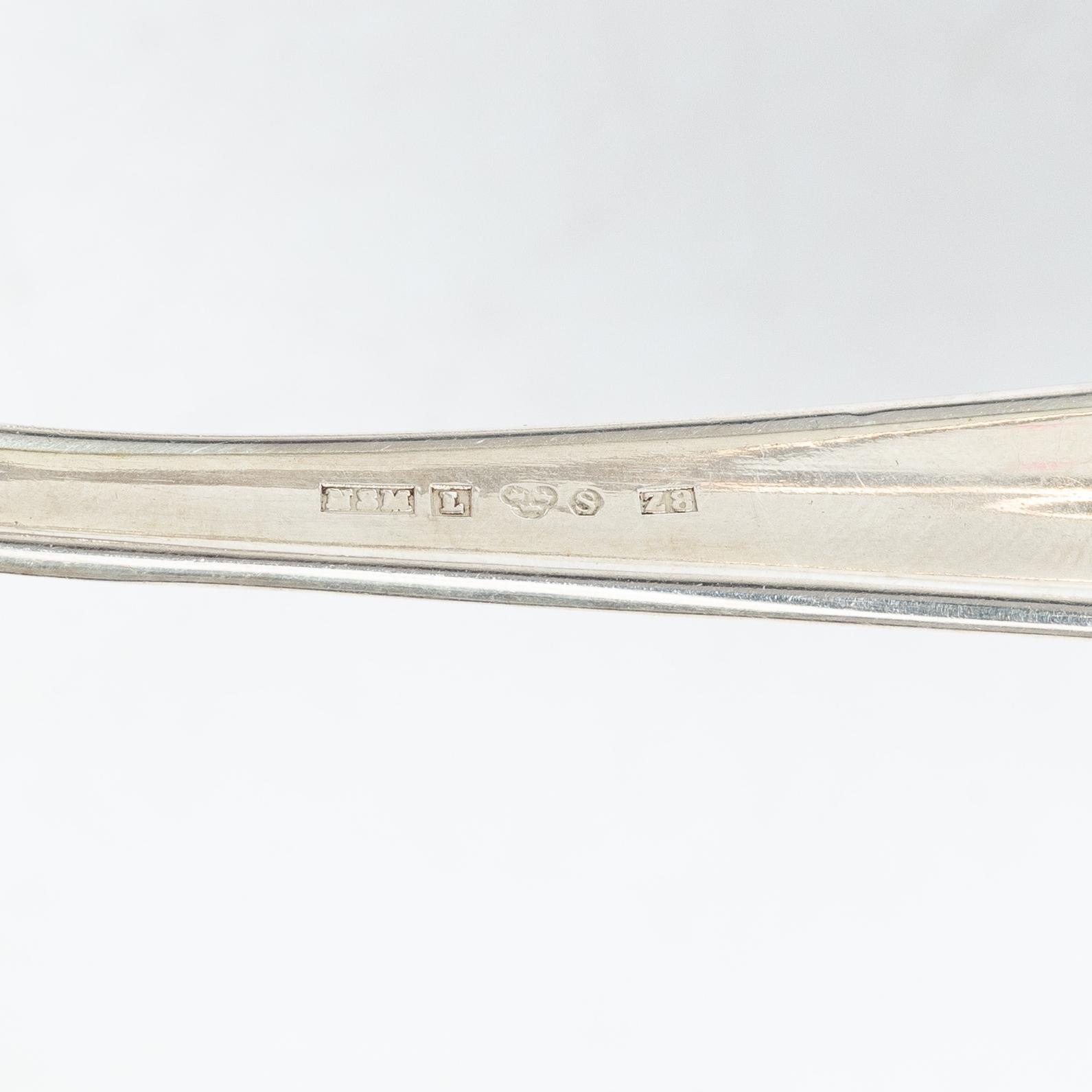 A 36 piece silver cutlery service, model Svensk Spets, mostly CG Hallberg, 1930s.