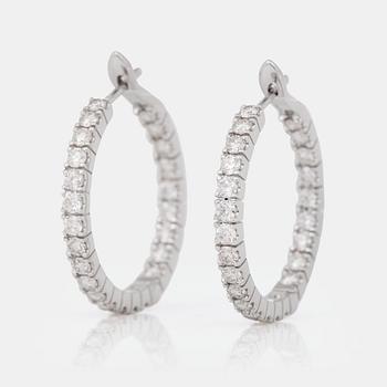 1219. A pair of diamond, 2.303 cts according to engraving, loop earrings.