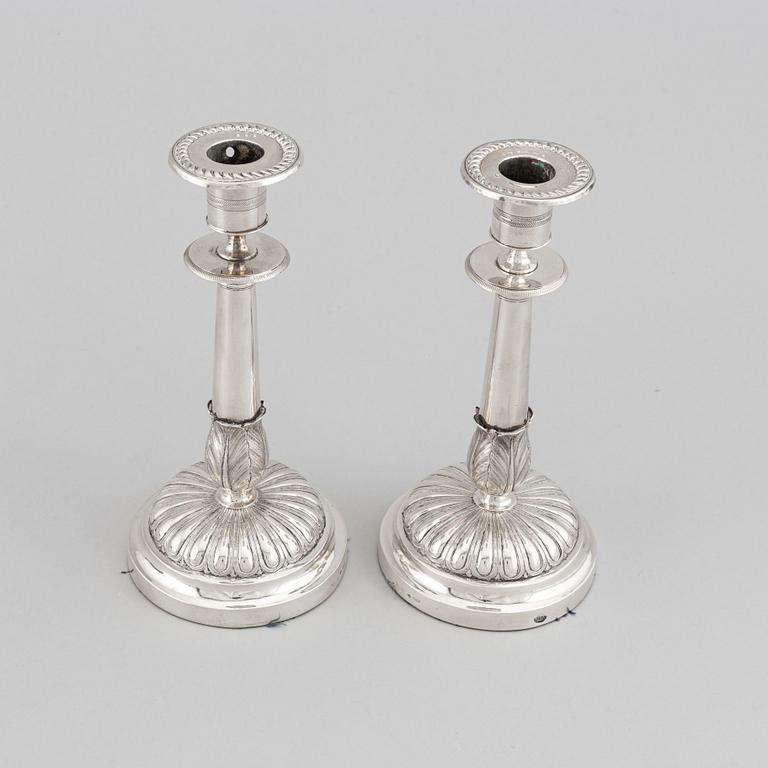 Gustaf Möllenborg, a pair of silver empire candlesticks, Stockholm 1829.