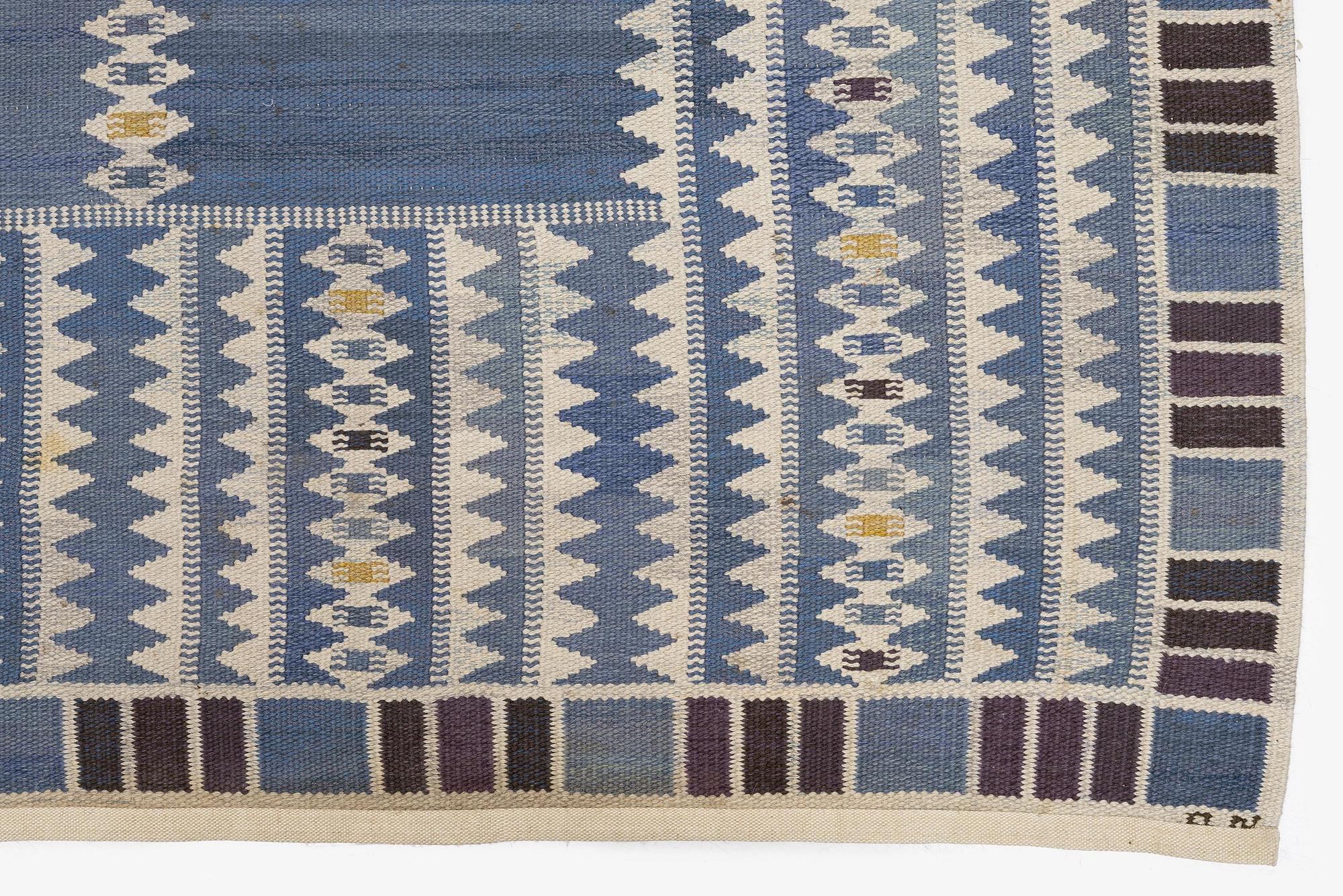 Barbro Nilsson, a carpet, "Salerno blå", flat weave, c. 314 x 255 cm, signed AB MMF BN.