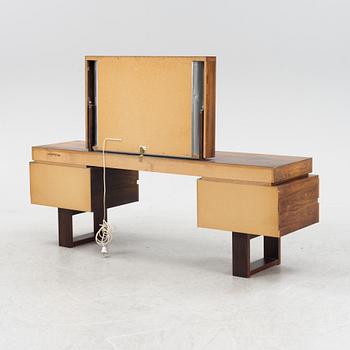 A rosewood veneered dressing table and ottoman, 1960's/70's.