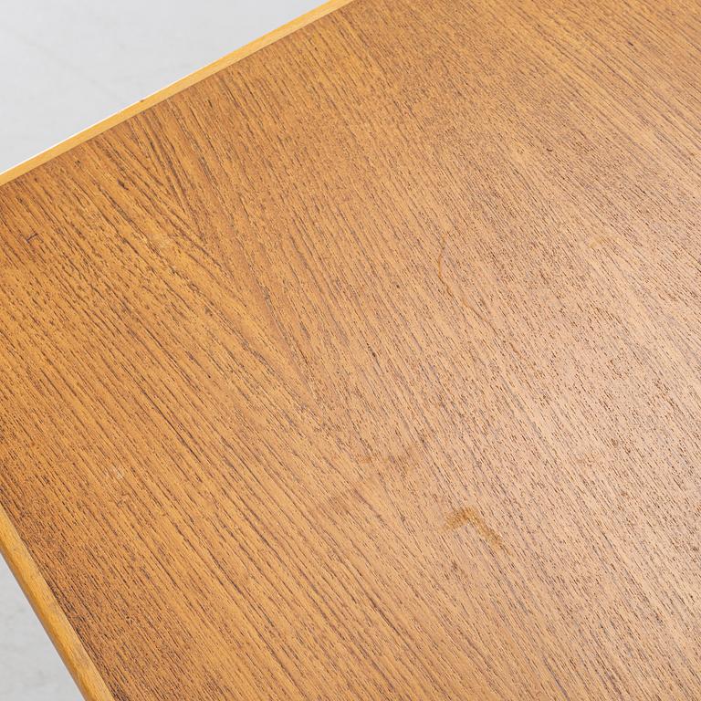 A mid20th century gate-leg table.