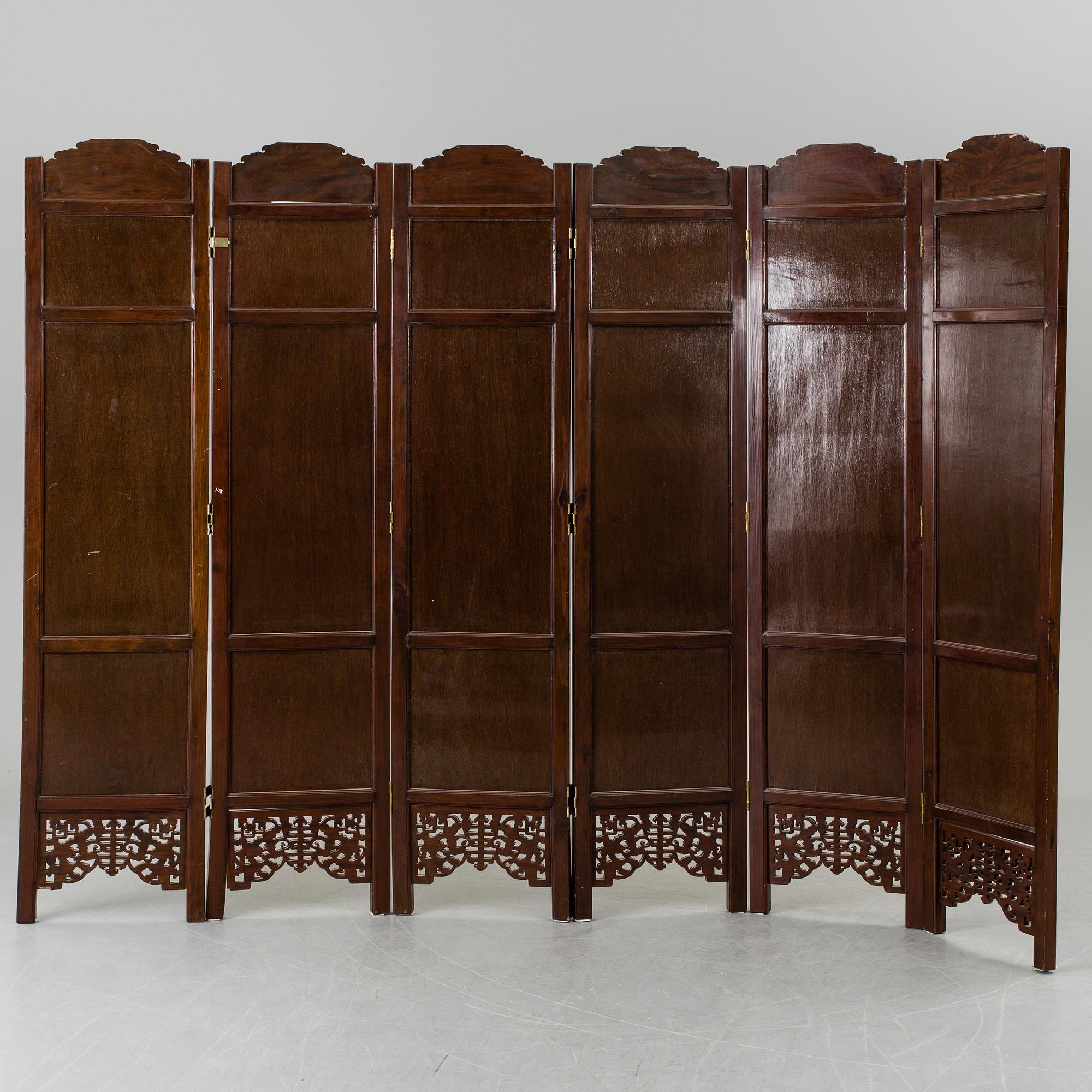 A chinese 20th century six-panel relief wood screen.