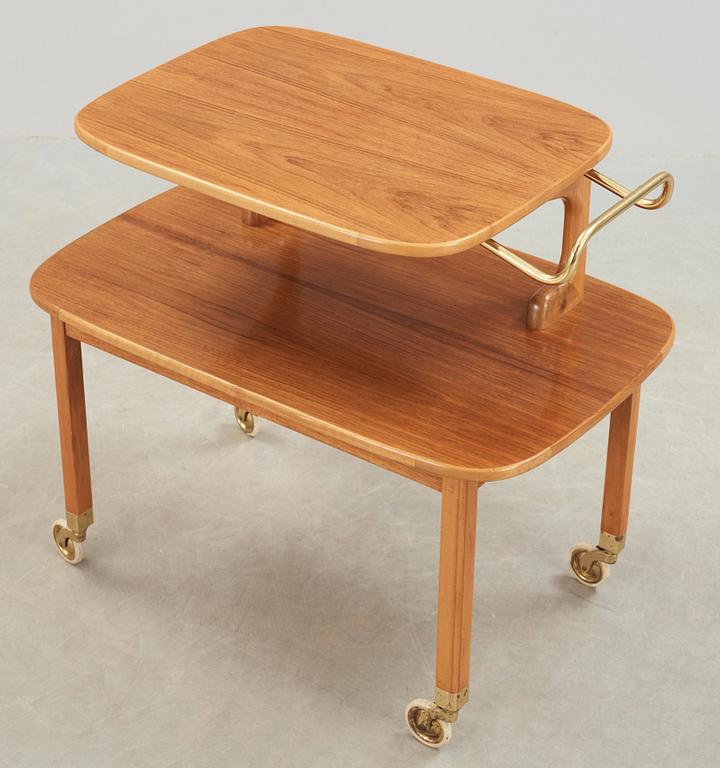 A Josef Frank walnut and mahogany serving trolley, Svenskt Tenn, probably 1950's.