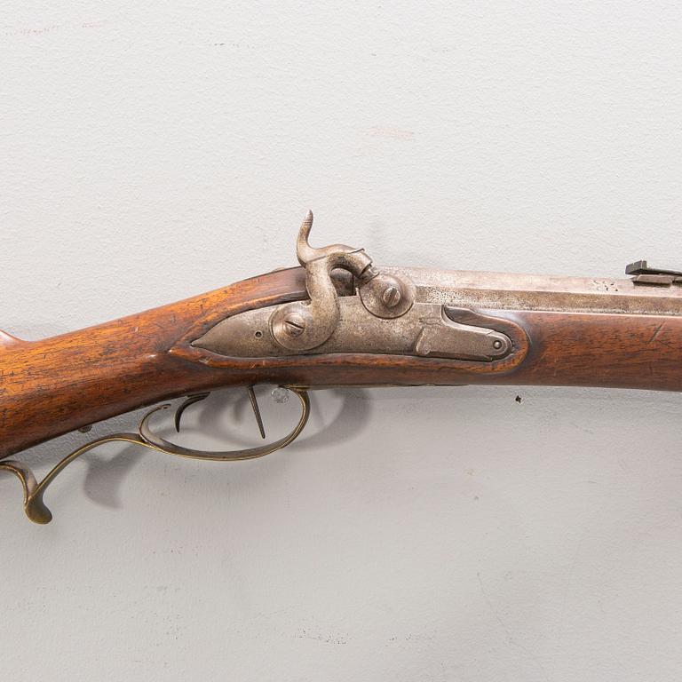 A percussion shotgun, carbine, 19th Century.