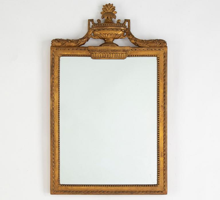 A Gustavian mirror, late 18th century.
