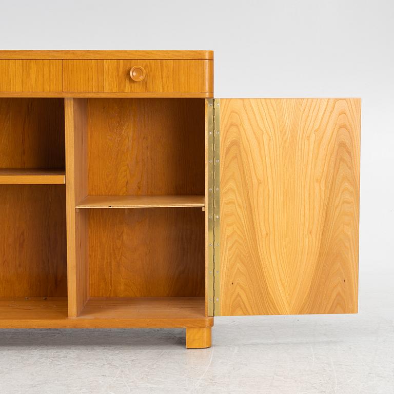 An elmwood-veneered bookcase, Nilsson & Johansson Möbelfabrik, Björnum, mid 20th century.