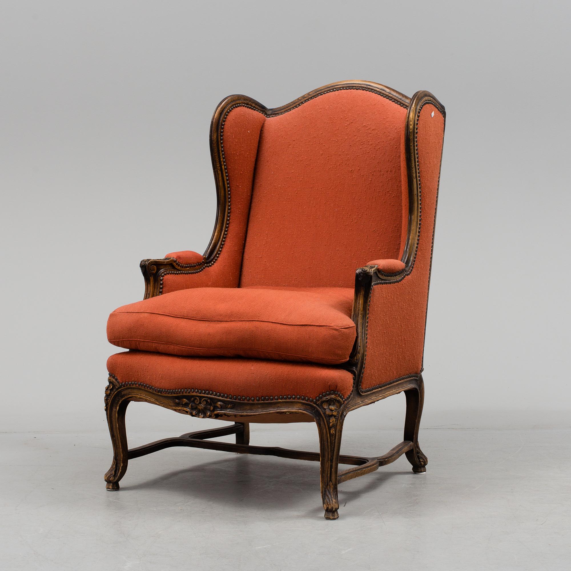 A Louis XV-style armchair, about 1900.