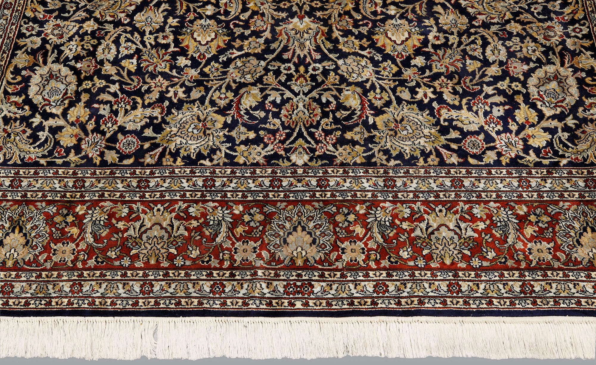 A silk Kashmir carpet, ca 280 x 188 cm.