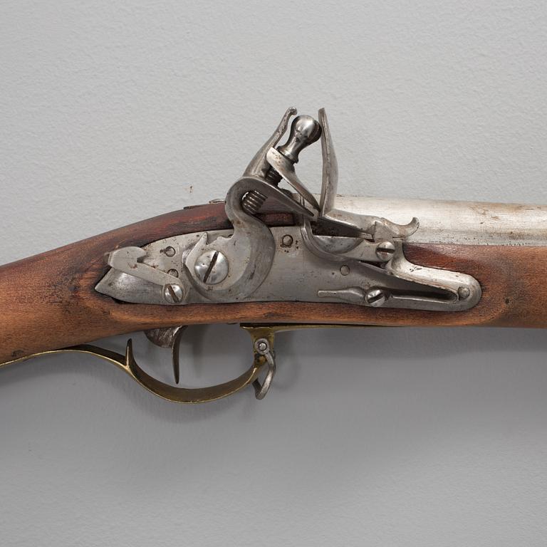 A flintlock rifle with bayonet early 19th century.