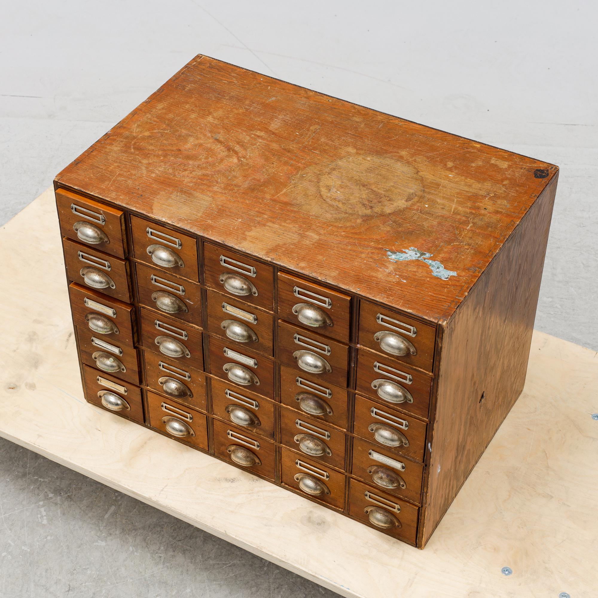 A pine cabinet with drawers, first half of the 20th Century.