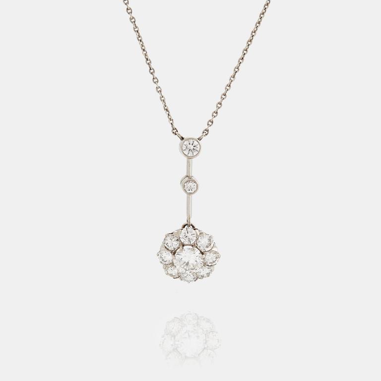 A NECKLACE set with a round brilliant-cut diamond.