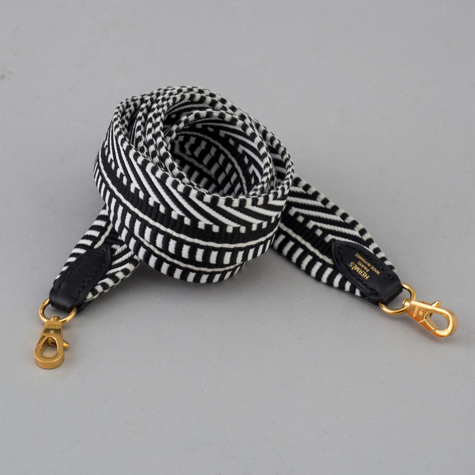 A bag strap by Hermès.