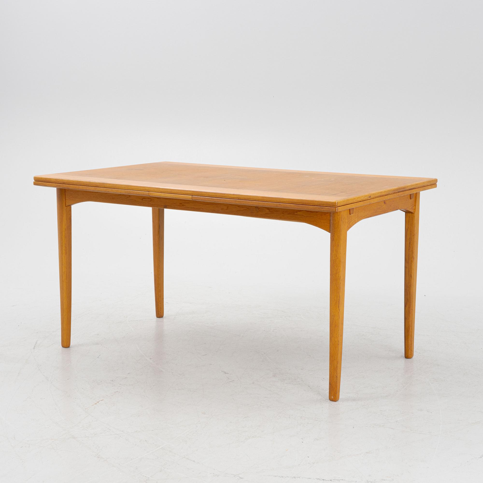 Carl Malmsten, dining table, "Calamare Nyckel", second half of the 20th century.