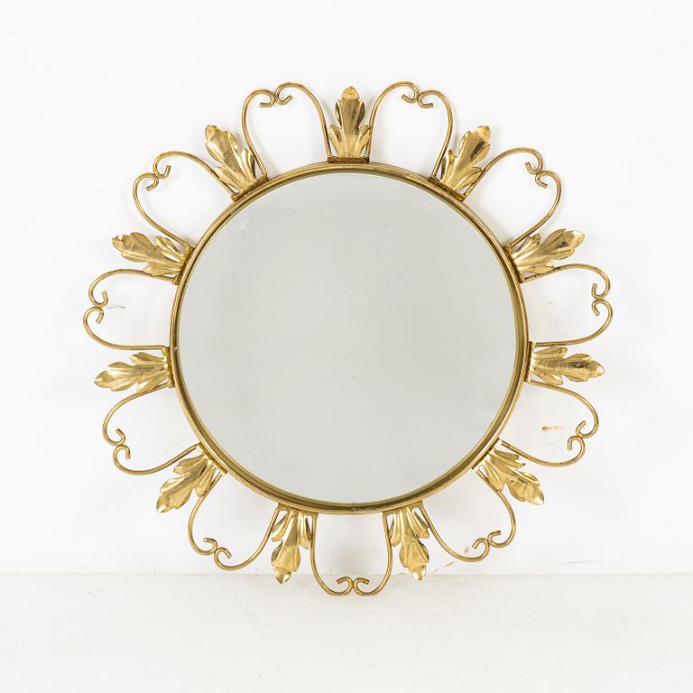 A brass mirror, second half of the 20th Century.