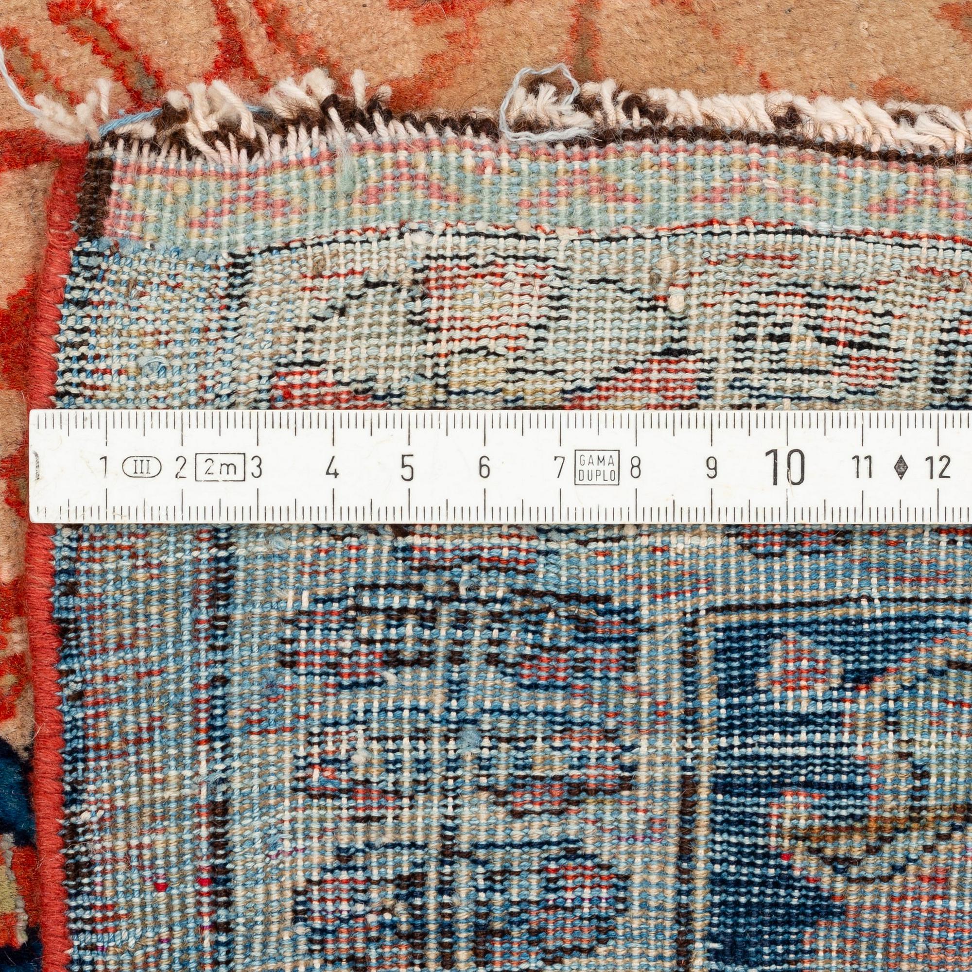 An antique part silk Kashan Motacham, ca 200 x 95,5-108 cm.